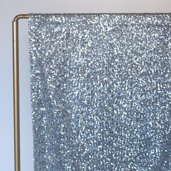 Hopeinen paljettikangas