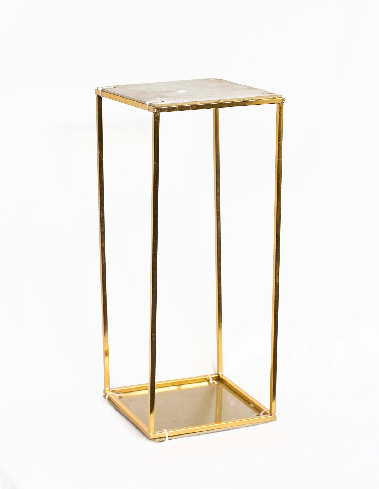 Gold-colored small stand for flower arrangements